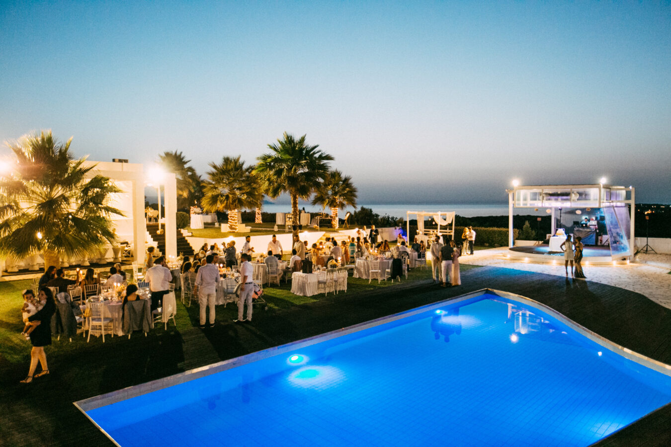 General view over the wedding estate floor plan and decoration set up on a wedding day in Ktima Reveli in Chania Crete photographer by wedding photographer from a higher vintage point.