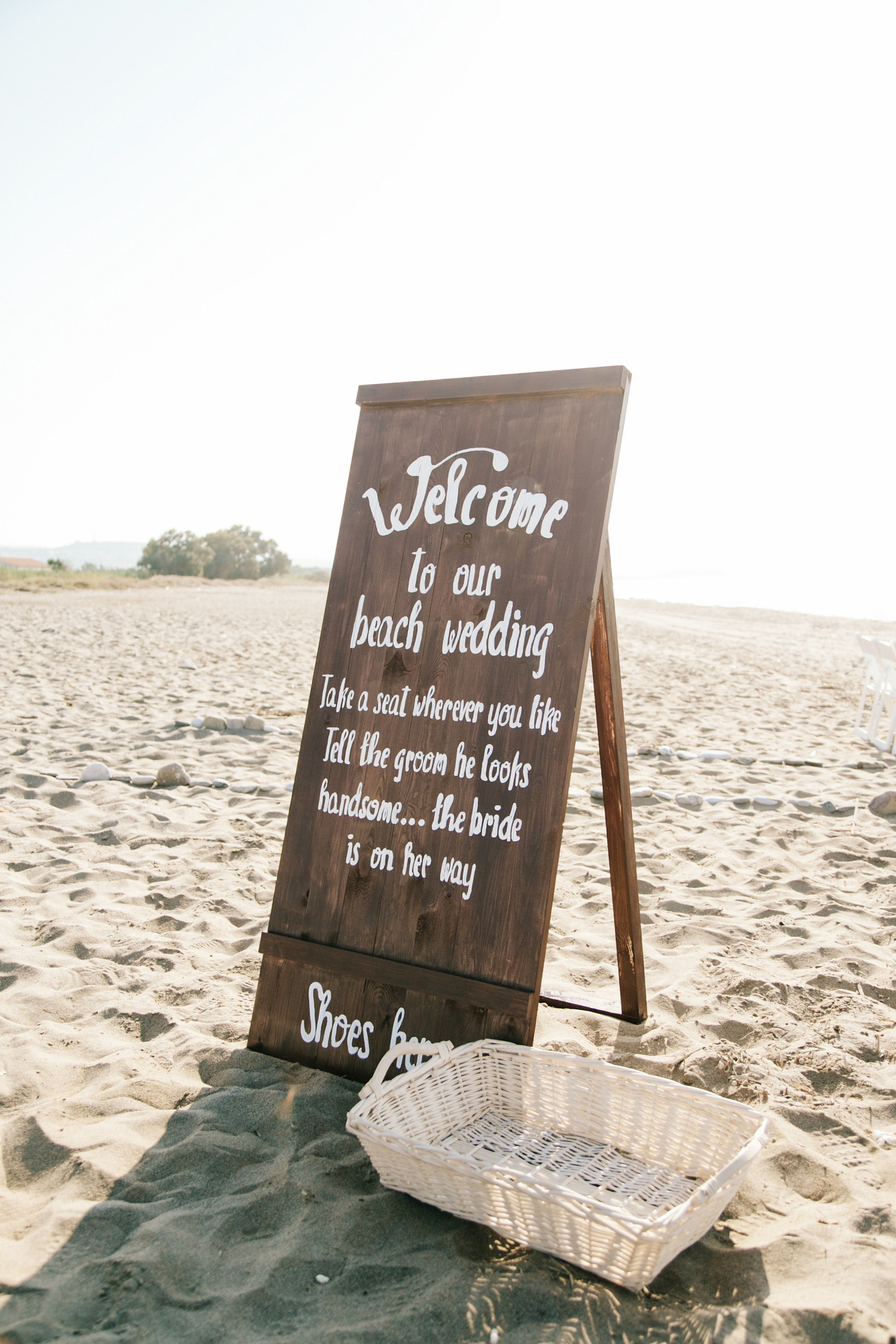 Welcome to our beach wedding sign positioned at the entrance to the ceremony location on the beach in Crete.