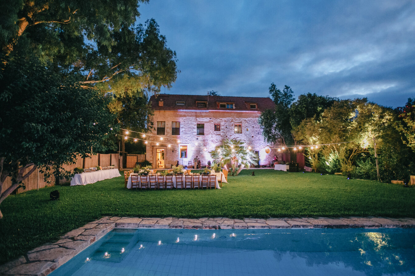 Rich wedding reception dinner setup for an exclusive wedding event in Metohi Kindelis, Chania, Crete photographed by professional photographer team.