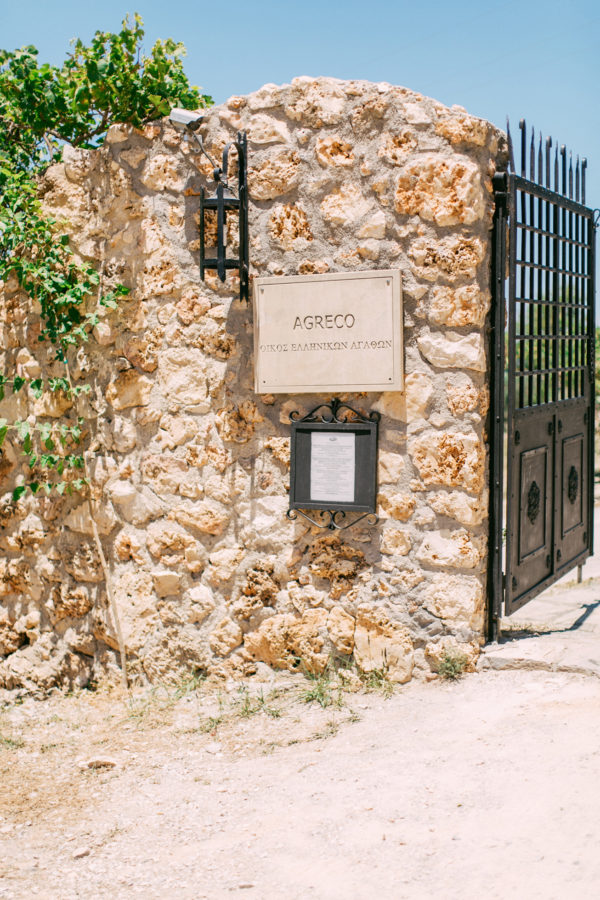 Rustic Agreco farm by Grecotel photographed on a sunny wedding day in Crete.
