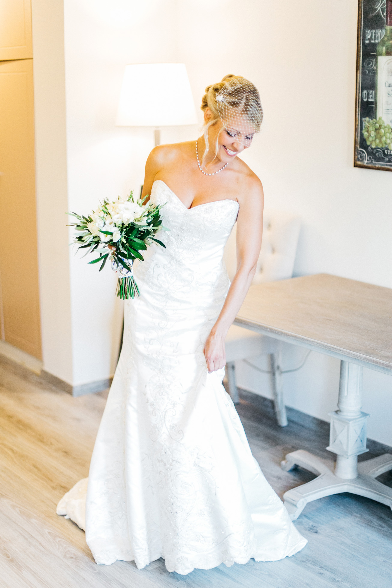 Professional portrait of a beautiful happy bride on her wedding day in Crete.