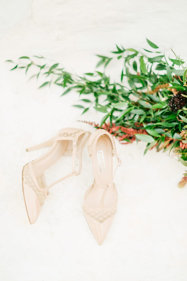 Bridal shoes and flowers for Mykonos wedding.