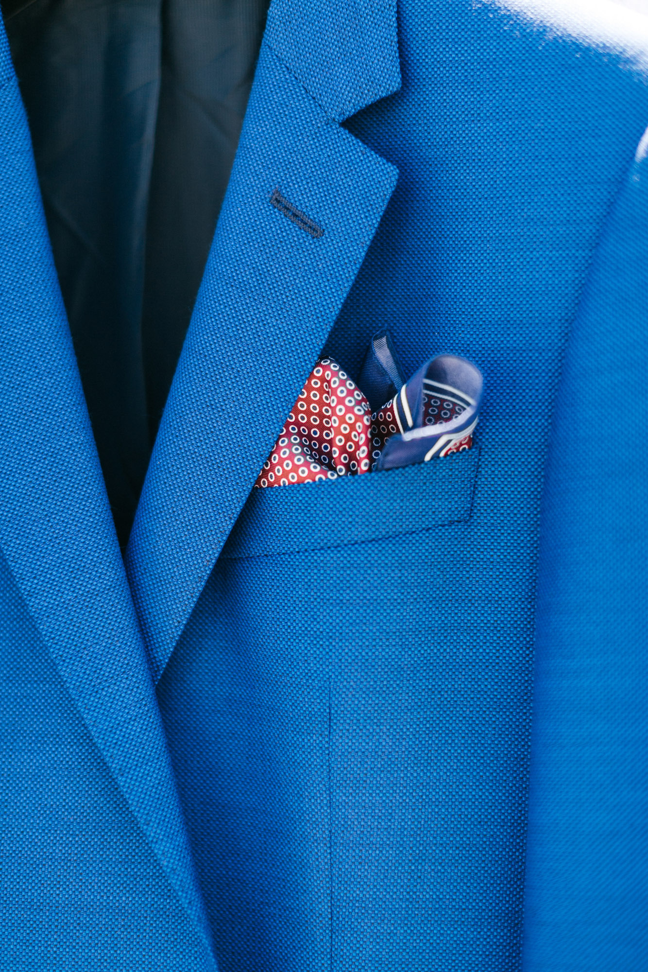 Groom's details for blue and white Santorini wedding.
