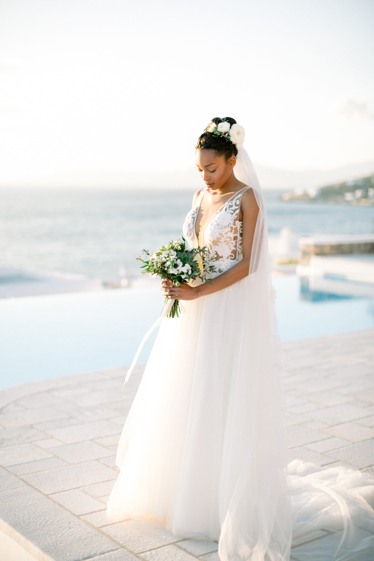 Stunning black bride at a villa wedding inspiration session by DeplanV in Loyal Villas Luxury, Mykonos, Greece.