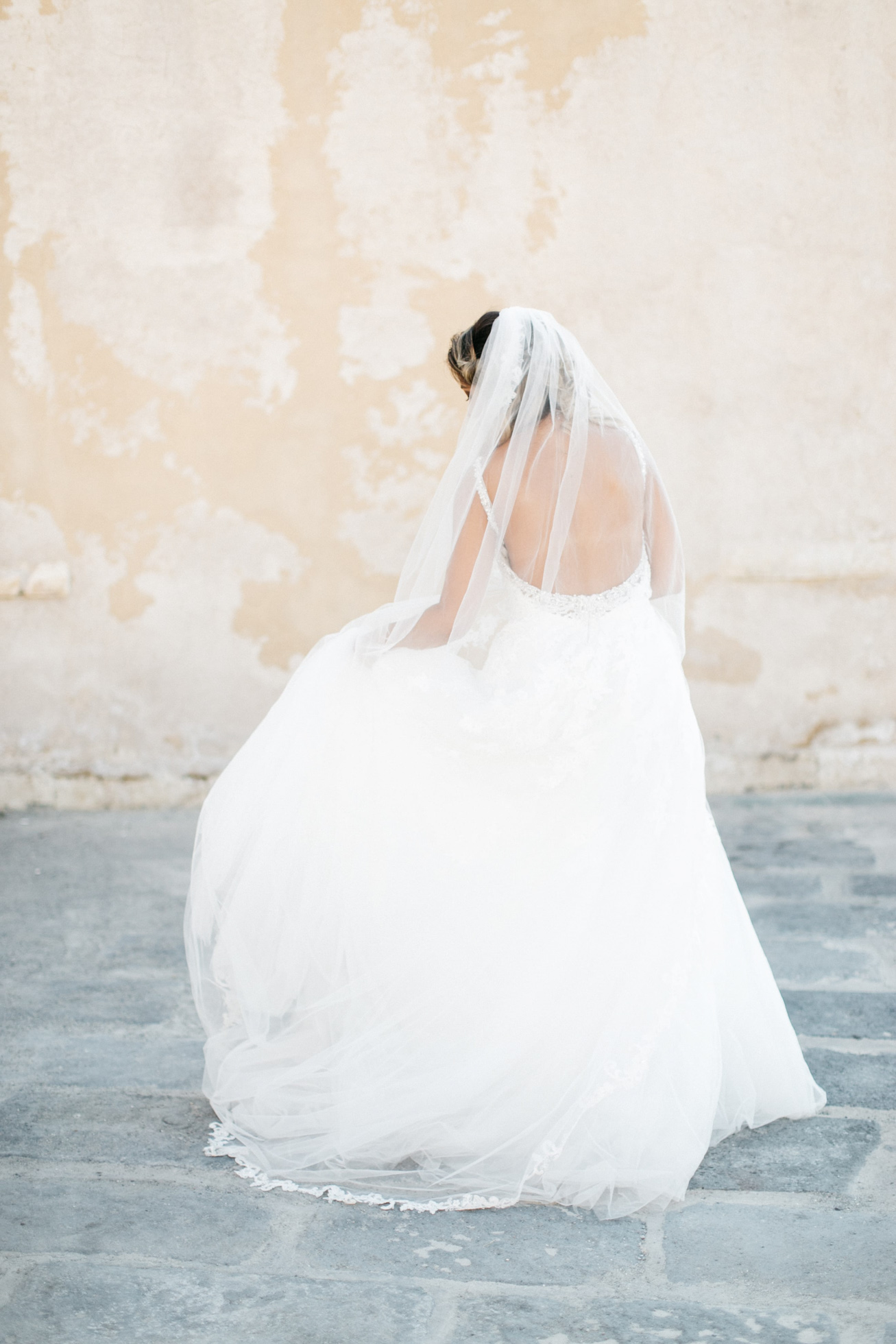 Elegant classy bride on her destination wedding day in Chania Crete Greece.