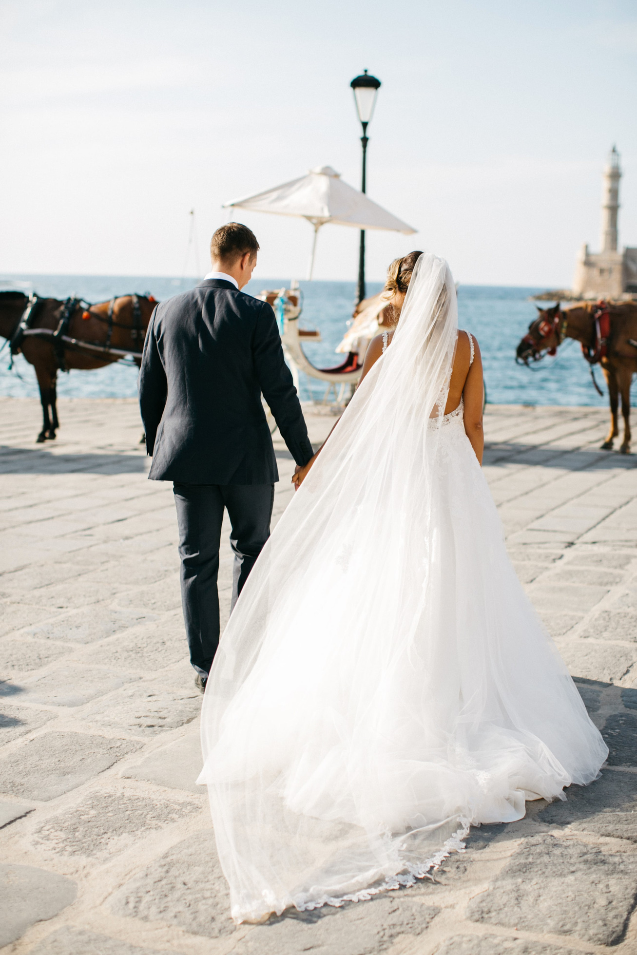 Elegant international couple on their destination wedding day in Chania Crete Greece.