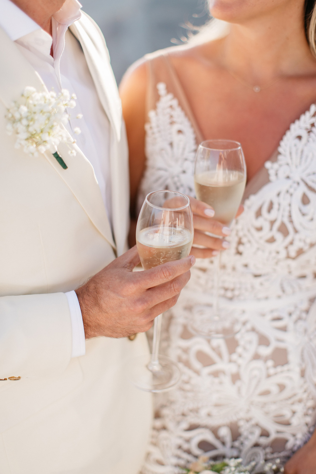 Wedding champagne toast in Canaves Suites Oia Santorini.