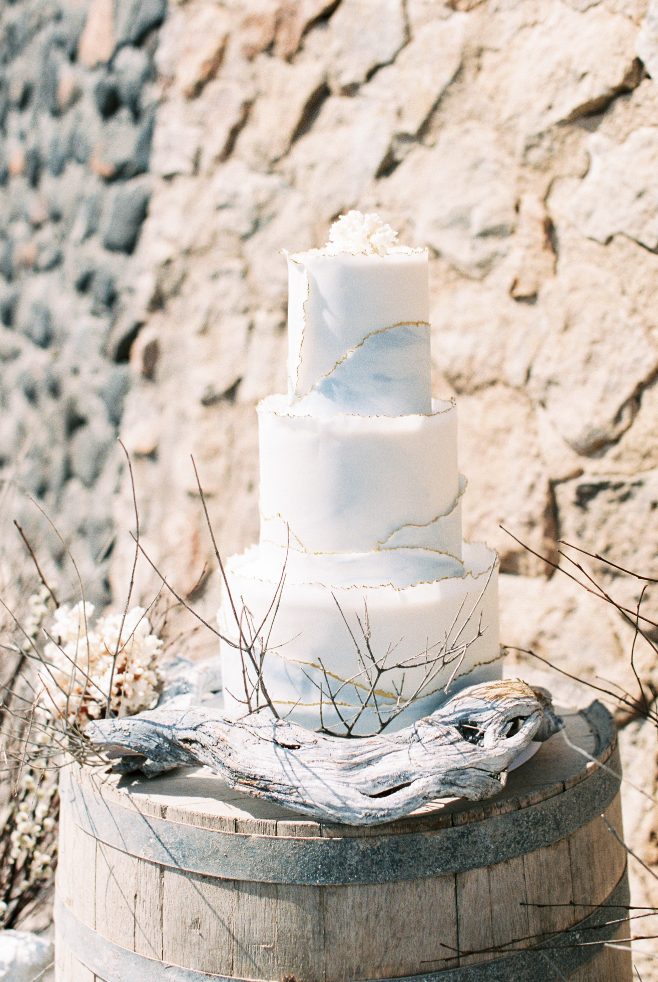Unique white coral wedding cake inspiration in Santorini Greece.