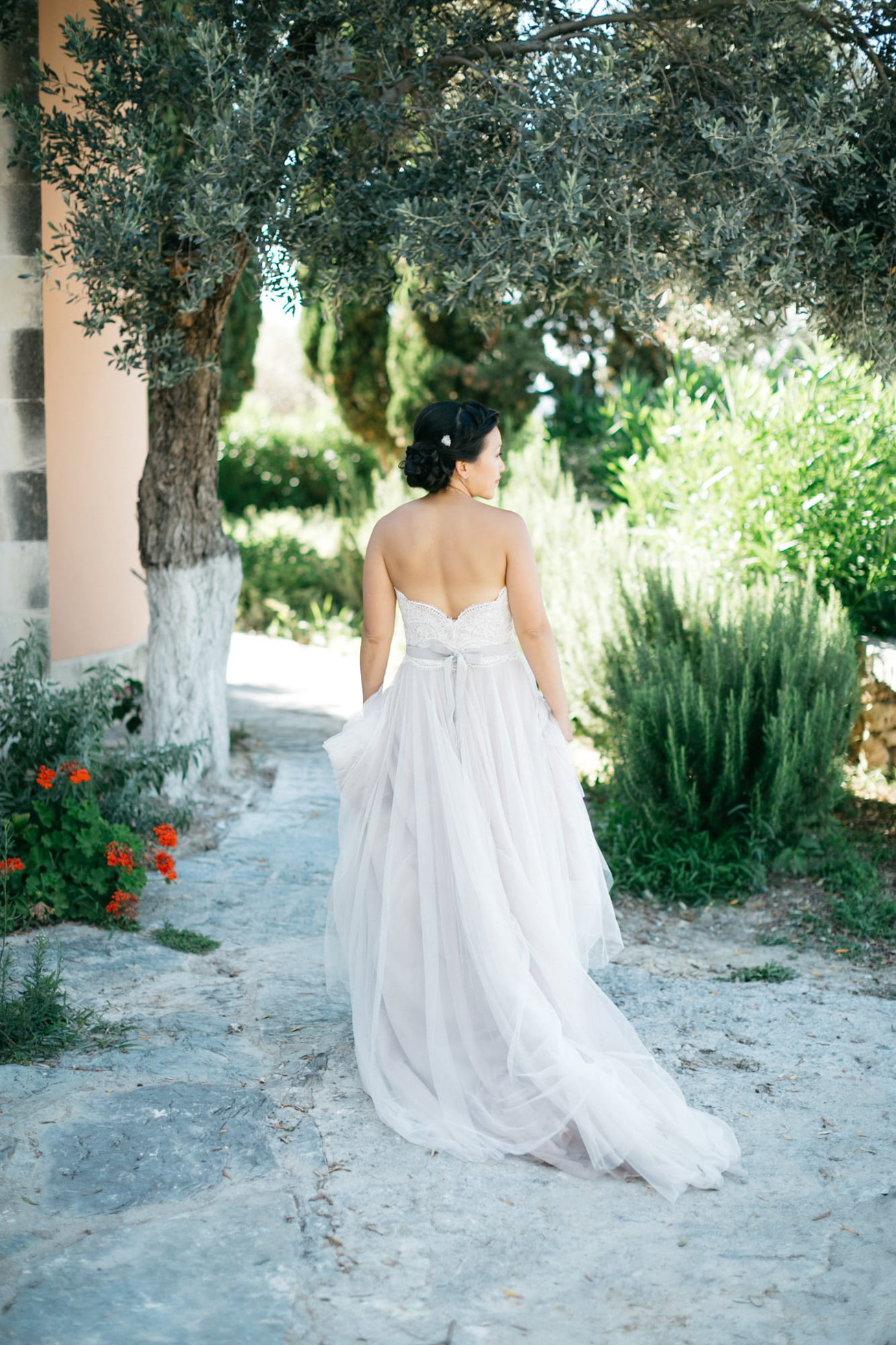 Elegant bride in Agreco Farms, Grecotel, Crete, Greece.