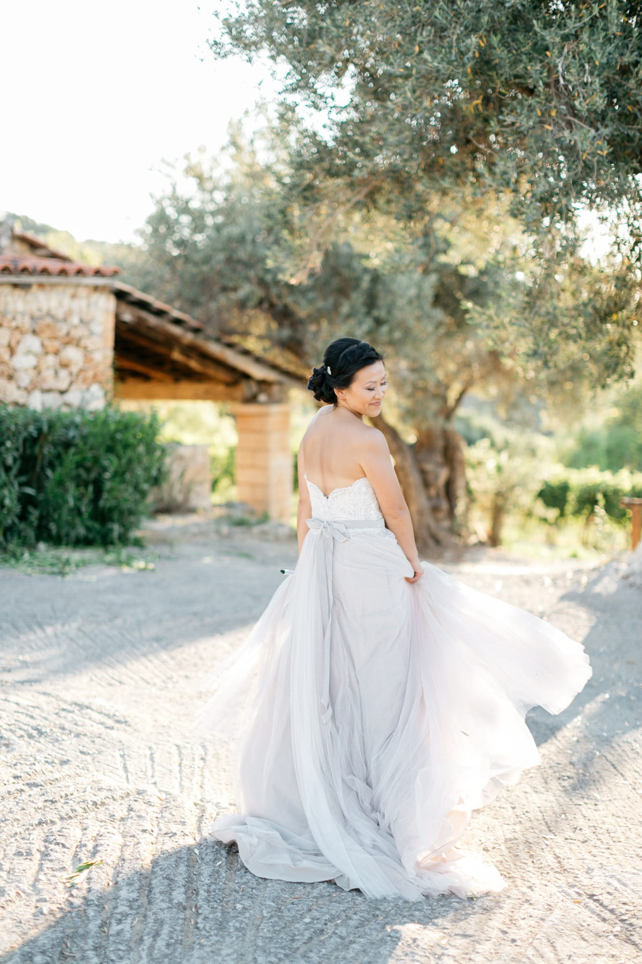 Elegant bride at her destination wedding in Agreco Farms, Grecotel, Crete, Greece