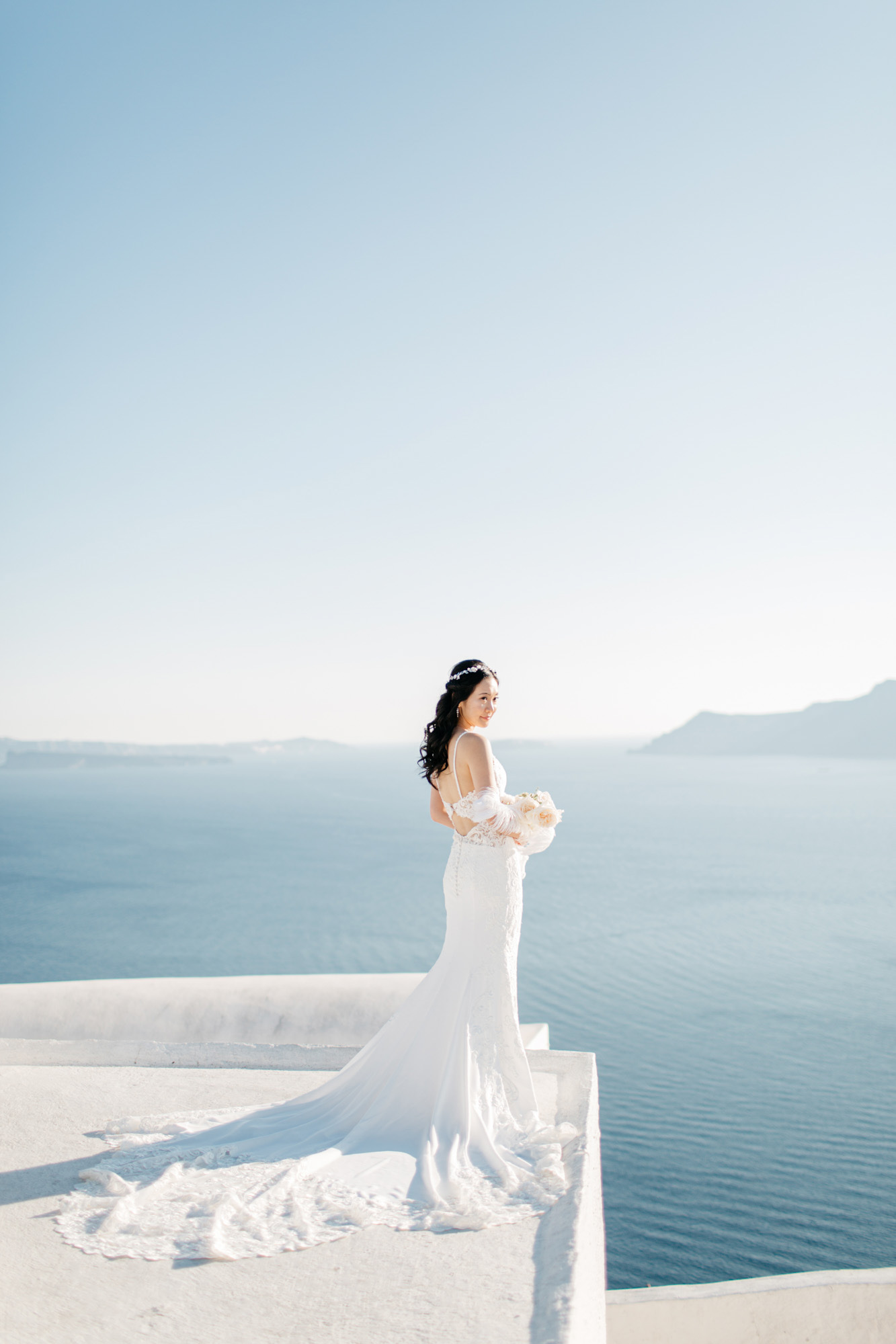 Classy destination wedding in Aenaon Villas in Oia Santorini Greece.