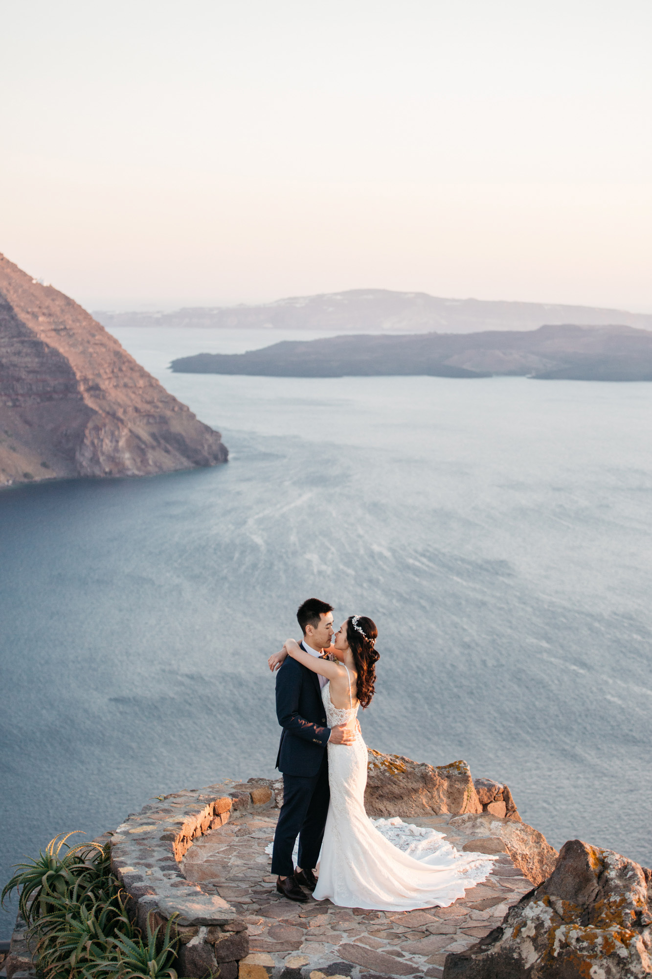 Intimate destination wedding in Aenaon Villas in Oia Santorini Greece.