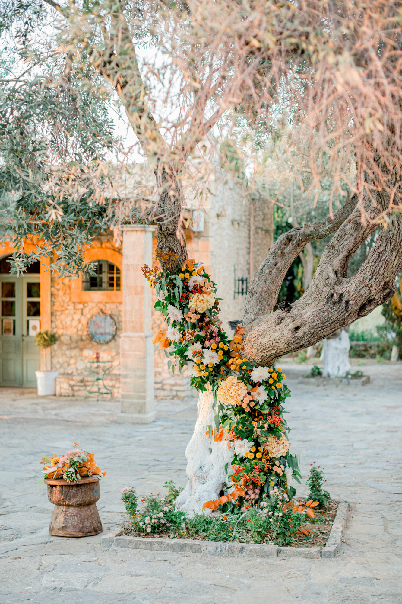 Reception decoration, flowers and details by R&C events and Oneiranthi for a sunset wedding editorial in Grecotel Agreco Farms Crete Greece.